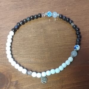 Hand Crafted Black and White Necklace with Silver Charm